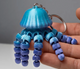 3D printed articulated jellyfish fidget toy keychain with flexible tentacles