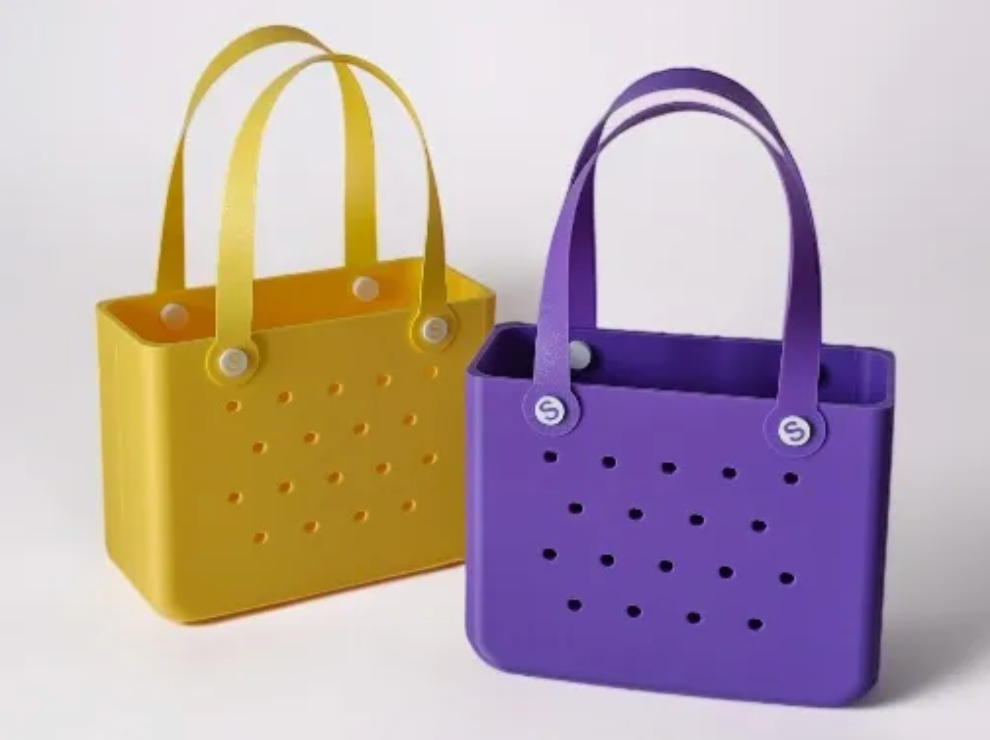 3D printed mini tote bag shown holding everyday essentials